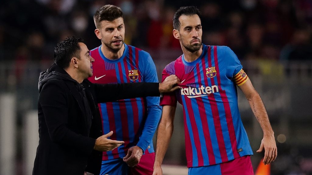 Xavi Hernandez, Sergio Busquets dan Gerard Pique